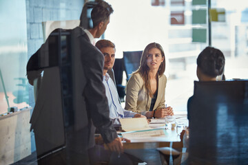 Review, meeting or people in office with guidance, brief or discussion for brand image....