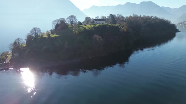 View of Comacina island from the village of Ossuccio on Lake Como