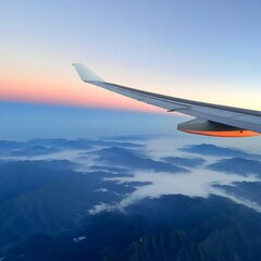 Fototapeta premium airplane wing sea of ​​clouds sunset