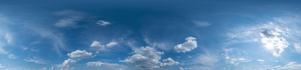 Seamless cloudy blue sky hdri panorama 360 degrees angle view with zenith and beautiful clouds for use in 3d graphics or game development as sky dome or edit drone shot