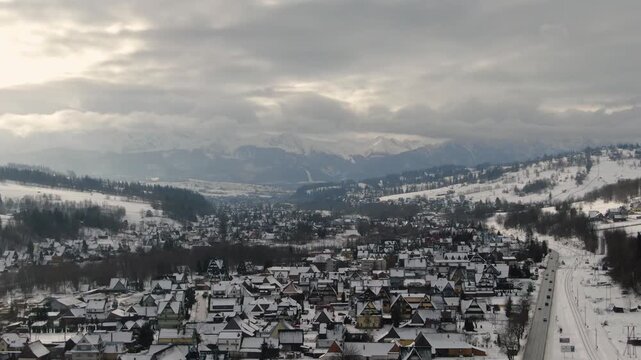 Aerial View of Poronin and the Zakopianka Road Leading to Snowy Tatra Mountains.