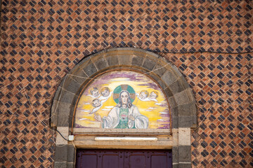 Mural above the door of a Christian church in Asmara, Eritrea