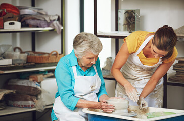 Creative, teacher and old woman with clay, workshop or teaching craft in class, learn and discussion. Instructor, help and senior person with smile for skills, retirement and lesson for handmade art