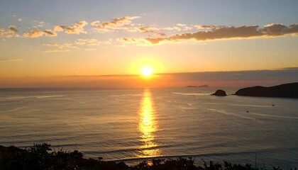 Sunrise over tranquil ocean