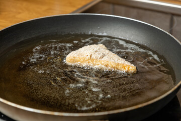 Crispy breaded cheese in the pan