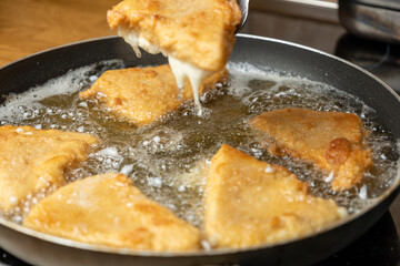 Crispy breaded cheese in the pan