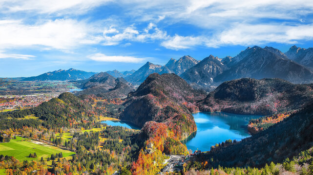Amazing Top view panorama of Alpsee and Schwangau village in autumn.
