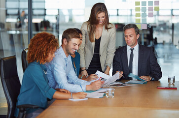 Document, business people or manager in meeting for annual planning, sales info or performance report. Goal setting, budget review or happy team with proposal in boardroom, ideas or growth strategy