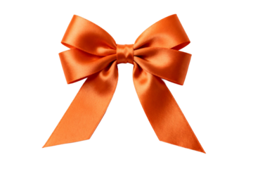 A bright orange ribbon bow for decorative purposes
