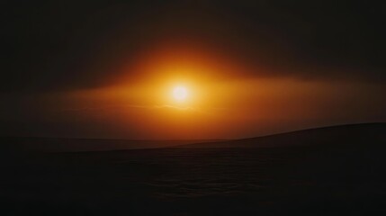 Fototapeta premium Spectacular Sunset Over Dunes with Dark Skies and Soft Shadows Casting a Tranquil Atmosphere in a Remote Desert Landscape