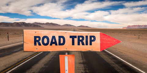 Road Trip sign with road background