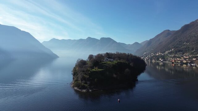 View of Comacina island from the village of Ossuccio on Lake Como