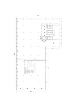 2D technical blueprint shows the main, L-shaped ground floor. Vast open floor plates ideal for retail/lobby use, two distinct service cores, clear column grids. Illustrating Commercial Base Building