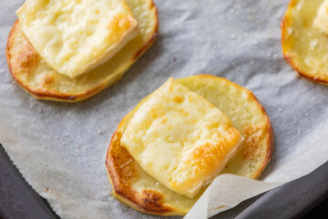 Baked Potato Circles Topped with Brie Cheese