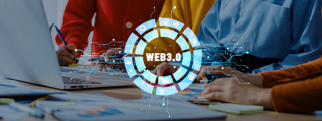 A modern workspace showcases a diverse team collaborating on innovative ideas, emphasizing the concepts surrounding Web 3.0 technology and digital transformation. Trope