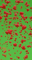 Floating Red Hearts on Green Background - A Symbol of Love and Affection.