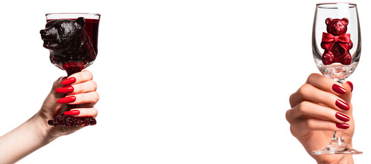 woman hands with elegant red manicure with wine glasses; adult christmas bear on/in isolated over white