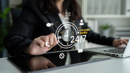 Concept of 24-hour customer service. Providing constant, non-stop support and assistance through...