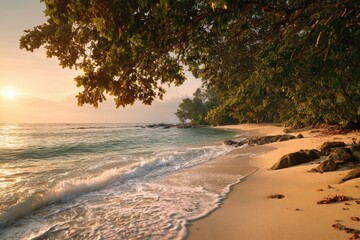 A scenic coastal view with golden light, sandy beach, gentle waves, and lush green foliage