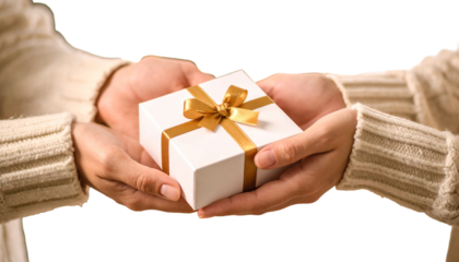 Close up of hands holding a small white gift box with a golden ribbon tied in a bow white background