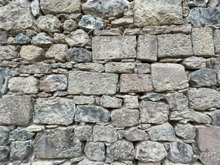 Ancient wall of brown stone