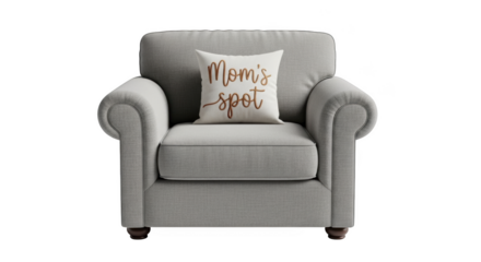 Light gray armchair with white pillow saying Moms spot