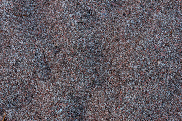 Granular sand texture background with mixed grains, ideal for website backdrops, packaging mockups, print layouts and graphic design projects.