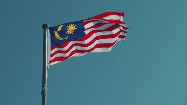 A Malaysian flag is flying