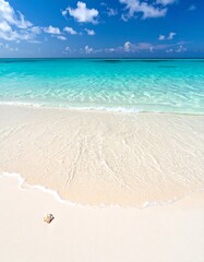 Tropical beach scene with turquoise water and white sand