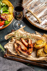 Barbecue pork ribs with roasted potatoes