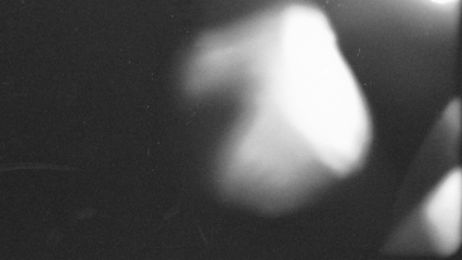 retro film overlay effect with scratch dust and light leaks, retro grain noisy film distressed texture light leak flare on black background,black and white abstract light background	