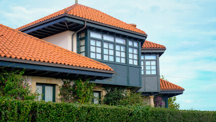 Beautiful traditional house in Northern Spain featuring a red terracotta tiled roof