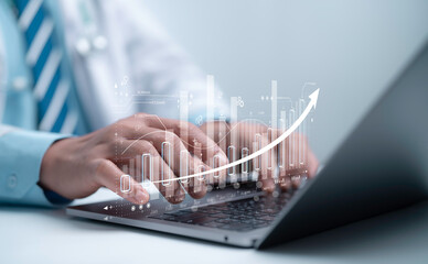 Doctor working on a laptop with rising digital analytics represents healthcare growth data driven medical performance improvement modern health technology and clinical efficiency advancements