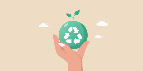 A hand holding an egg shaped object with a recycling symbol