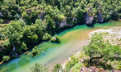 Blue canoe in the Tarn river - France