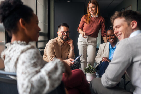 Group of Colleagues Engaging in a Productive Office Discussion