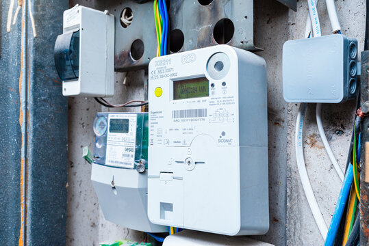 Kilowatt huor smart electric power metters counter measuring power usage modern smart grid residential digital power supply meter Selective focus, close-up.Telsiai, Lithuania.12-09-2025.