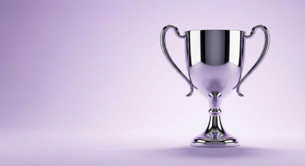 A shiny trophy sits on a plain surface, representing victory. This trophy is awarded to the champion during an annual competition celebration, symbolizing achievement and recognition.