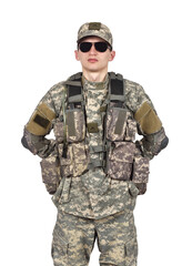 Obraz premium An American soldier in camouflage uniform and sunglasses stands with his hands behind his back
