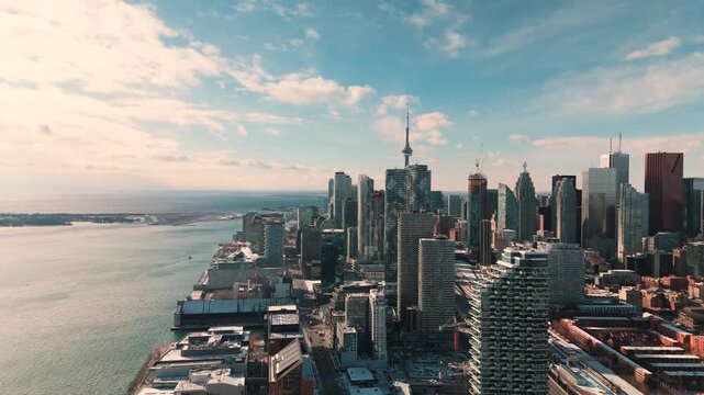 TORONTO, ONTARIO - JANUARY 1, 2025: Winter skyline and Lake Ontario from aerial perspective