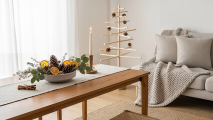 Cozy living room with festive decor and wooden table centerpiece  