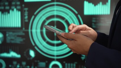Professional individual woman in navy suit uses smartphone while standing, glowing digital dashboards, data analytics, futuristic interface elements, advanced technology for business intelligence. - Powered by Adobe