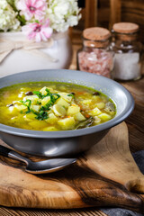 Barley soup with vegetables and chicken.