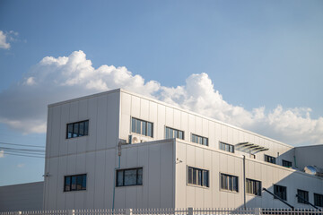 Factory Industry Building Panoramic Background, Architecture Large Warehouse with Louver Ventilation and Ladder on White Aluminium Wall against Blue Sky Backdrop Design, Front view with copy space