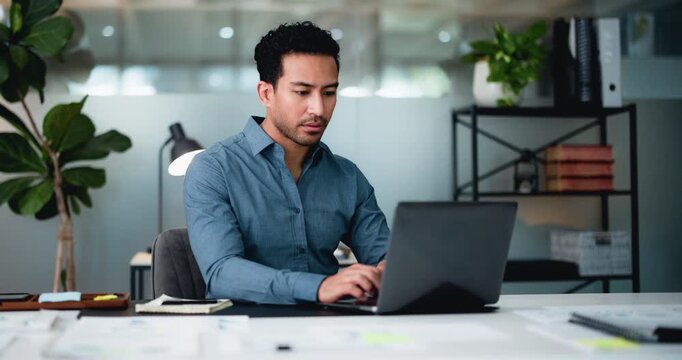 Man, laptop and project at startup with review, documents and typing with report at media company. Person, computer and insight for web traffic, feedback or stats with paperwork at creative agency