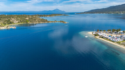 Aerial drone view of Fteroti Beach, sandbanks and lagoon in Sithonia, Chalkidiki, Greece