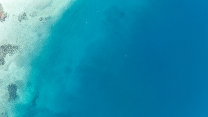 Aerial drone view of Fteroti Beach, sandbanks and lagoon in Sithonia, Chalkidiki, Greece