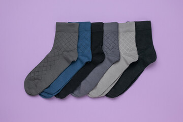 Collection of Stylish Multi-Color Socks on Pastel Background