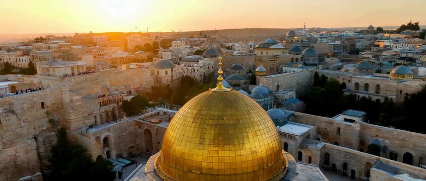 Cinematic Aerial Drone View of Jerusalems Golden Dome at Sunrise.