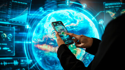 Business woman holding smartphone in front of futuristic digital interface, global communication, technology networking, data connectivity, mobile interaction, high-tech environment.